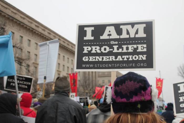 Credit : A march participantholds up a pro-life sign at the March for Life in Washington, D.C. on January 22, 2016.