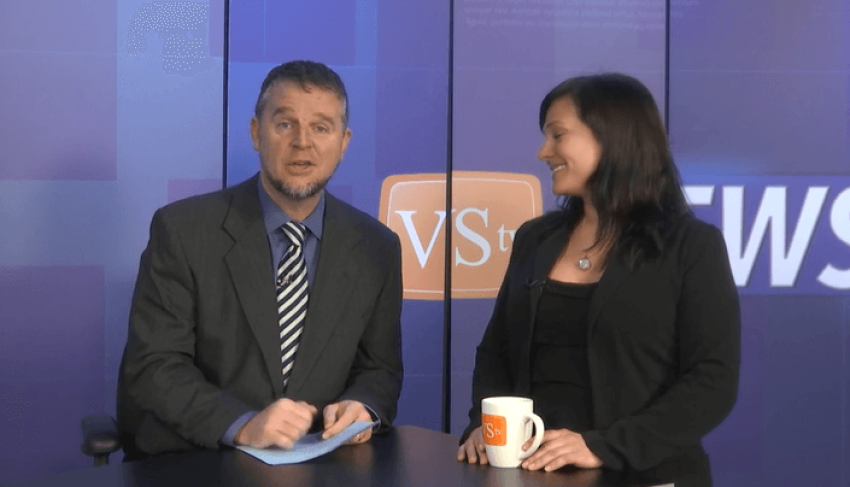 Morning News anchor Chris Quimby, left, on the verge of saying a prayer by mistake.