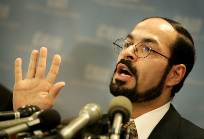 Nihad Awad, Executive Director of the Council on American-Islamic Relations (CAIR), speaks to the press in Washington September 22, 2004. Awad asked that U.S. authorities give an explanation why ex-pop singer Cat Stevens, a Muslim, will be deported to Britain after being denied entry to the United States.