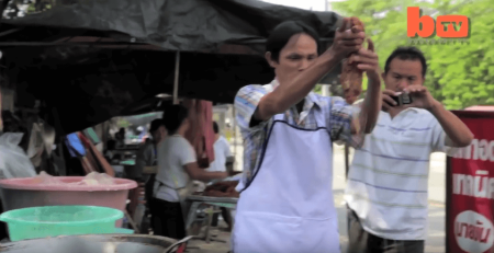 Man can fry chickens with bare hands.