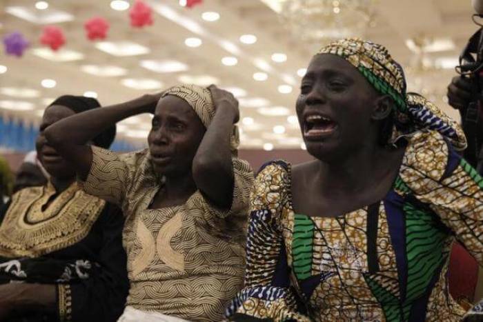 Parents of the Chibok girls cry during their meeting with Nigeria's President Muhammadu Buhari at the presidential villa in Abuja, Nigeria, January 14, 2016.