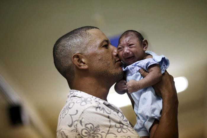 Geovane Silva holds his son Gustavo Henrique, who has microcephaly, at the Oswaldo Cruz Hospital in Recife, Brazil.