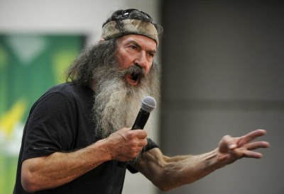 'Duck Dynasty' star Phil Robertson fires up the crowd at a campaign event at the Western Iowa Tech Community College in Sioux City, Iowa, on Jan. 30, 2016.