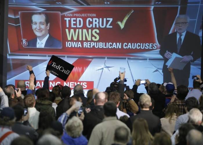 A screen shows CNN projecting U.S. Republican presidential candidate Ted Cruz will win the Iowa caucus in Des Moines, Iowa, United States, February 1, 2016.