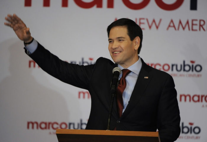 Republican presidential candidate Marco Rubio waves to supporters during the Rubio watch party at the Downtown Marriott Hotel in Des Moines Iowa February 1 2016.