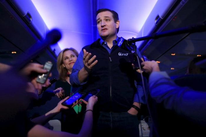 U.S. Republican presidential candidate Ted Cruz and his wife Heidi speak to the press aboard a plane en route to a campaign event in Piedmont, South Carolina February 2, 2016.