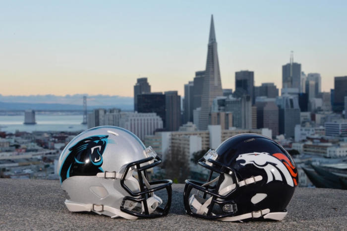 Carolina Panthers and Denver Broncos helmets with the San Francisco skyline and Bay Bridge as a backdrop prior to Super Bowl 50 between the Carolina Panthers and the Denver Broncos, San Francisco, California, February 2, 2016.