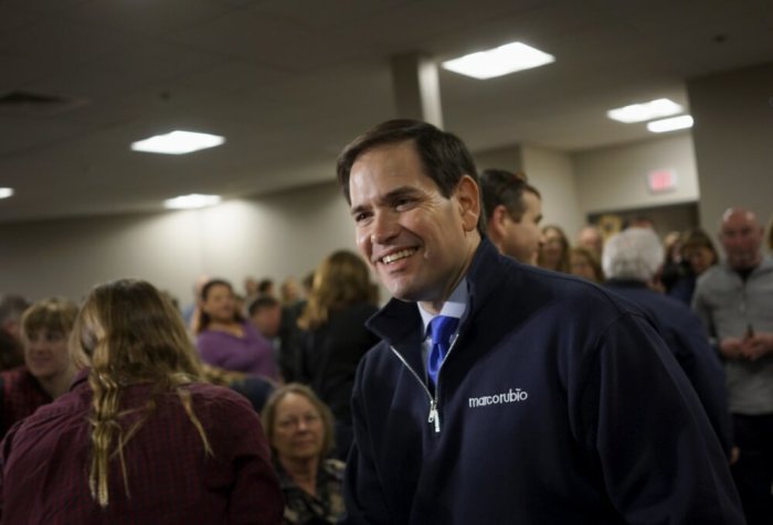 U.S. Republican presidential candidate Marco Rubio talks to employees after a campaign event at the Timberland headquarters in Stratham, New Hampshire, February 4, 2016.