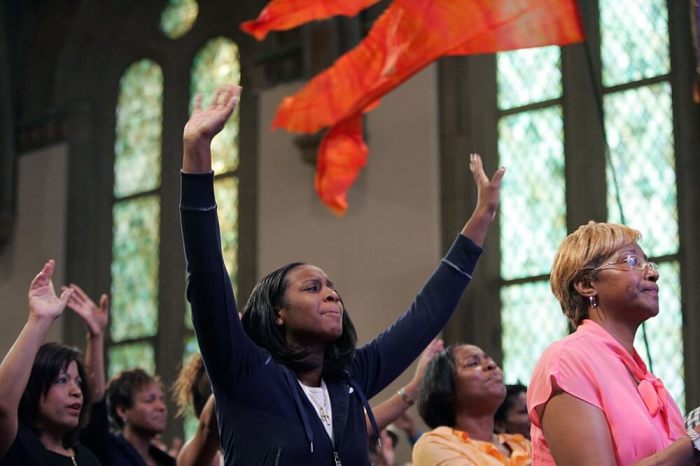 Churchgoers sing praises during the third service of the morning at Christ Church in Montclair, New Jersey, on September 4, 2005. The church, which holds five services every Sunday to accommodate the interest of their more then 5,000 members, is planning to build a larger facility in nearby Rockaway Township despite resistance from residents and the local government.