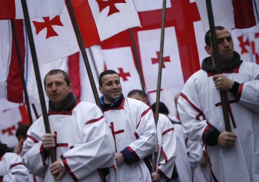 Participants march on the street during "Alilo," a religious procession to celebrate Orthodox Christmas in Tbilisi, Georgia, January 7, 2016. Georgian Orthodox believers celebrate Christmas on January 7, according to the Julian calendar.