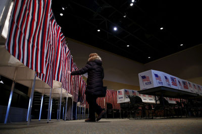 People vote at a polling place in Crossway Christian Church in Nashua, New Hampshire, February 9, 2016.