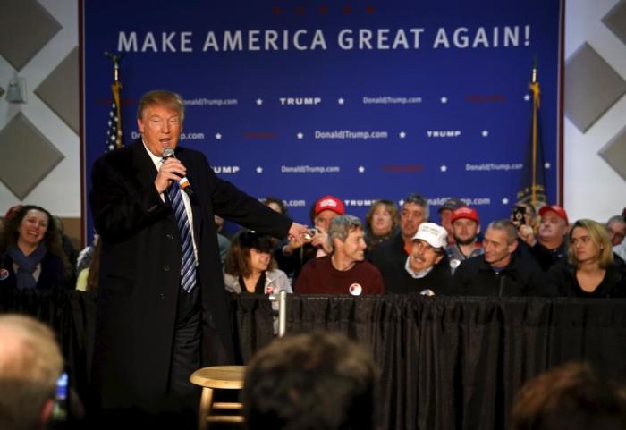 Republican U.S. presidential candidate Donald Trump speaks at a Trump town hall campaign event at the Lions Club in Londonderry, New Hampshire February 8, 2016. Candidates are campaigning for a final day before New Hampshire's crucial first-in-the-nation presidential primary.