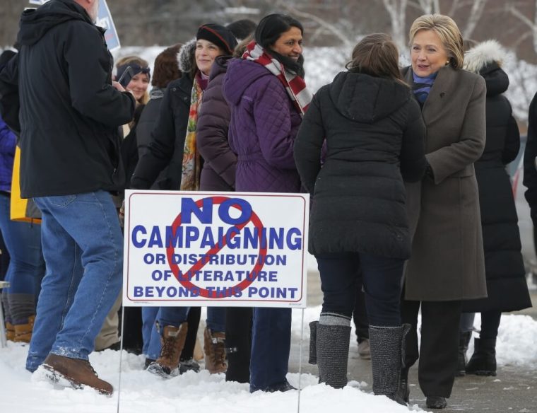 U.S. Democratic presidential candidate Hillary Clinton greets supporters outside a polling place in Nashua, New Hampshire, February 9, 2016, the day of New Hampshire's first-in-the-nation primary.