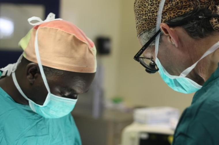 The Rev. Dr. Paul Osteen operates during a medical mission in far western Zambia where he visited Mukinge and Chitokoloki Hospitals.