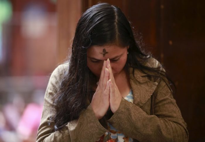 A Catholic faithful participates in the traditional Ash Wednesday service at the 20 de Julio Church in Bogota, Colombia, February 10, 2016. Wednesday marked the first day of the 40-day period of Lent during which Roman Catholics are called to make some form of sacrifice, usually by fasting for a short period of time.