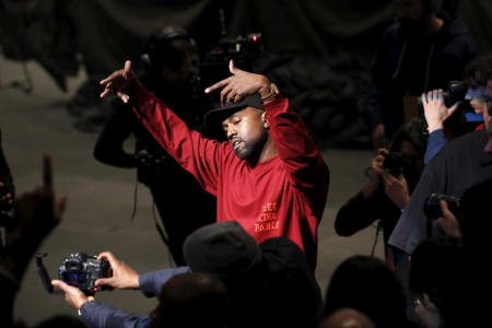 Kanye West dances during his Yeezy Season 3 Collection presentation and listening party for the "The Life of Pablo" album during New York Fashion Week February 11, 2016.