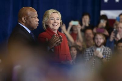 U.S. Representative John Lewis (D-GA) (L) and Democratic presidential candidate Hillary Clinton appear at a campaign rally in Las Vegas, Nevada February 14, 2016.