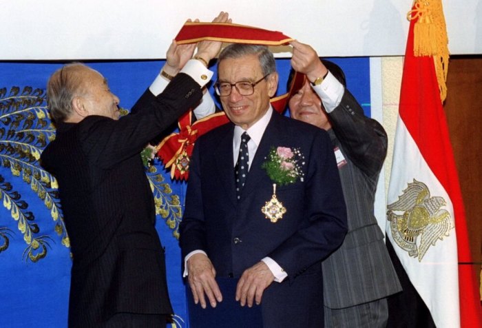 To mark his contributions to world peace, United Nations Secretary General Boutros Boutros-Ghali is awarded the Great World Peace Award from the Oughtopia Peace Foundation of South Korea at Seoul's university on March 29, 1996.