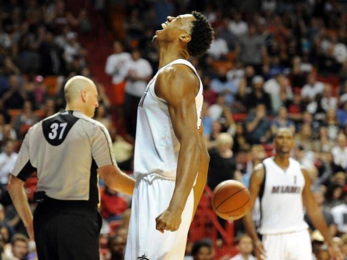 Miami Heat center Hassan Whiteside shows emotion after scoring in a game against the Portland Trailblazers.