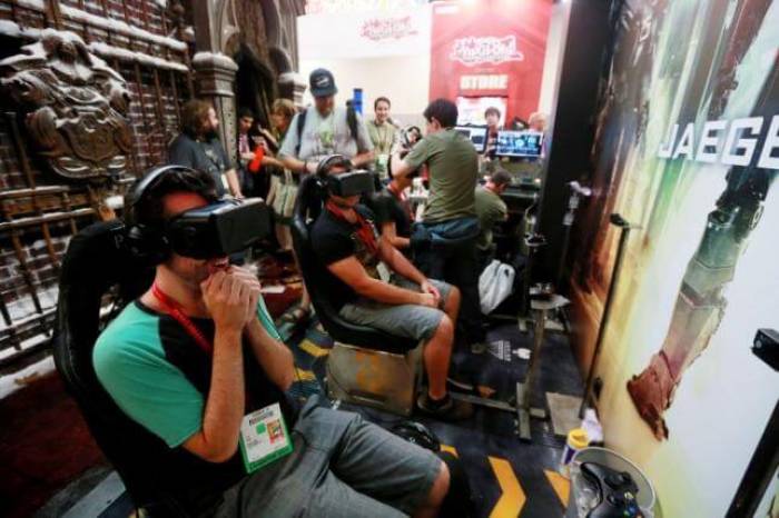 Attendees wearing Oculus Rift virtual reality headsets view a 3-dimensional video for the ''Pacific Rim: Jaeger Pilot'' video game during the 2014 Comic-Con International Convention in San Diego, California July 25, 2014.