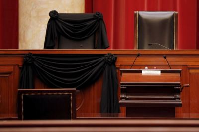 The bench of late Supreme Court Justice Antonin Scalia is seen draped with black wool crepe in memoriam inside the Supreme Court in Washington, February 16, 2016.