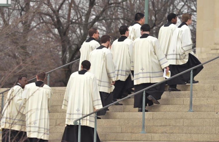 Priests arrive at the funeral Mass for the late Supreme Court Justice Antonin Scalia at the Basilica of the National Shrine of the Immaculate Conception in Washington, February 20, 2016.