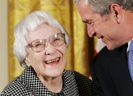 U.S. President George W. Bush (R) before awarding the Presidential Medal of Freedom to American novelist Harper Lee (L) in the East Room of the White House, in this November 5, 2007, file photo. Lee, who wrote one of America's most enduring literary classics, 