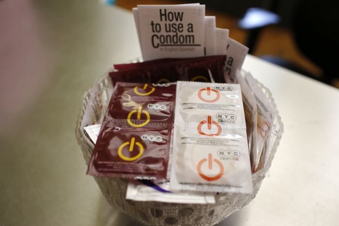 A bowl of free New York City condoms are seen in a lobby at the AIDS Service Center of New York City lower Manhattan headquarters, July 3, 2012.