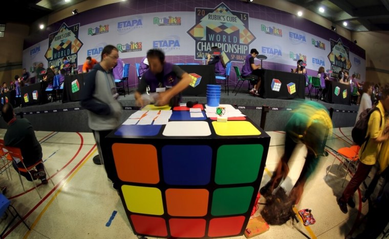 Participants attend the Rubik's Cube World Championship in Sao Paulo, Brazil, July 17, 2015.