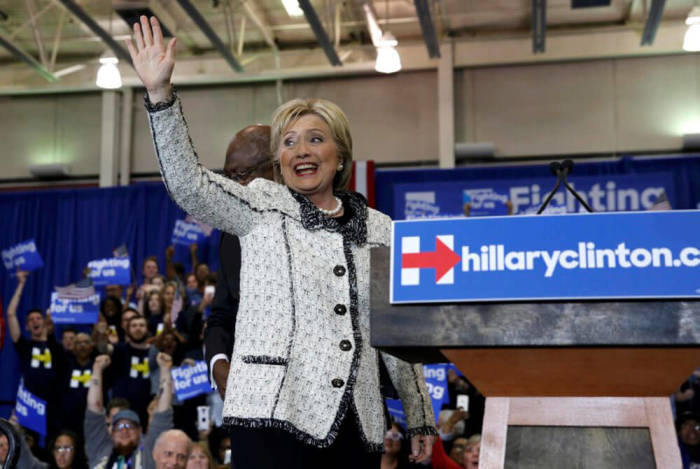 Democratic U.S. presidential candidate Hillary Clinton waves to supporters as she arrives at her South Carolina primary night party in Columbia, South Carolina, February 27, 2016.