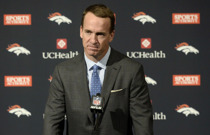 Denver Broncos quarterback Peyton Manning reacts during his retirement announcement press conference at the UCHealth Training Center, Englewood, Colorado, March 7, 2016.