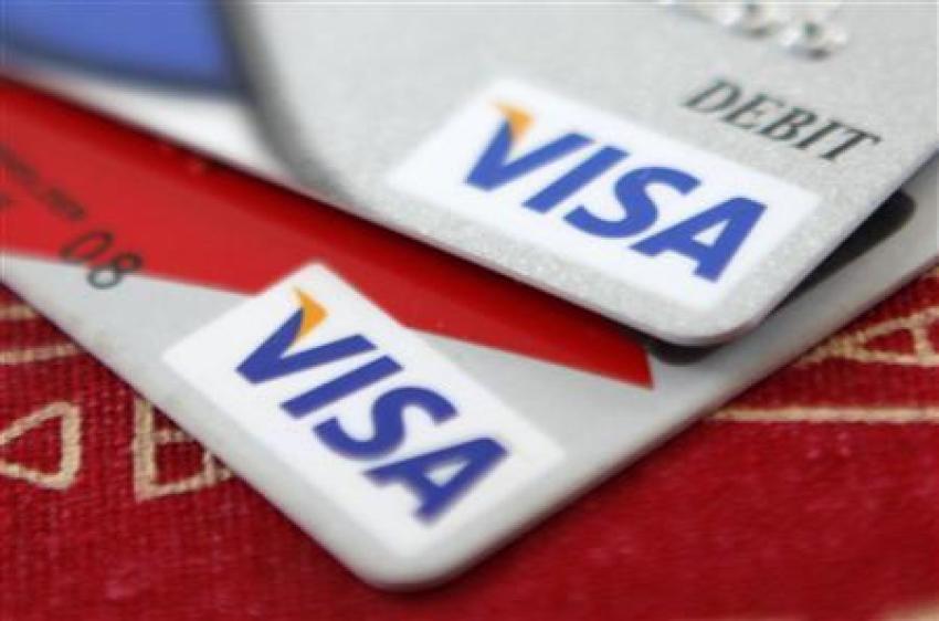 Visa credit cards are displayed in Washington in this October 27, 2009, file photo. Visa Inc's adjusted profit topped Wall... JASON REED July 25, 2012 07:37pm EDT