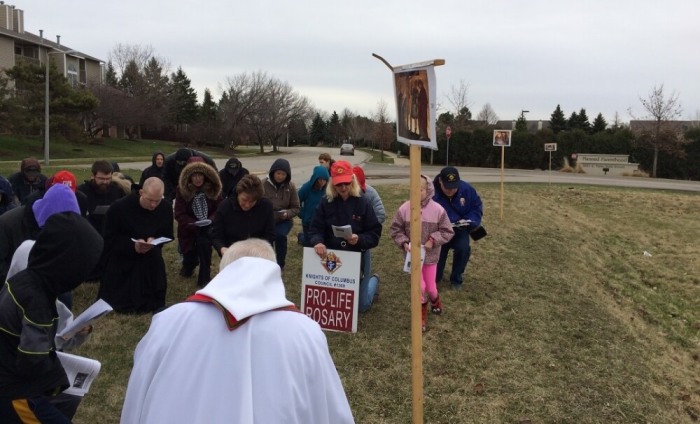 Abbot John Brahill leads the Way of the Cross for Victims of Abortion at Planned Parenthood in Aurora, Illinois.