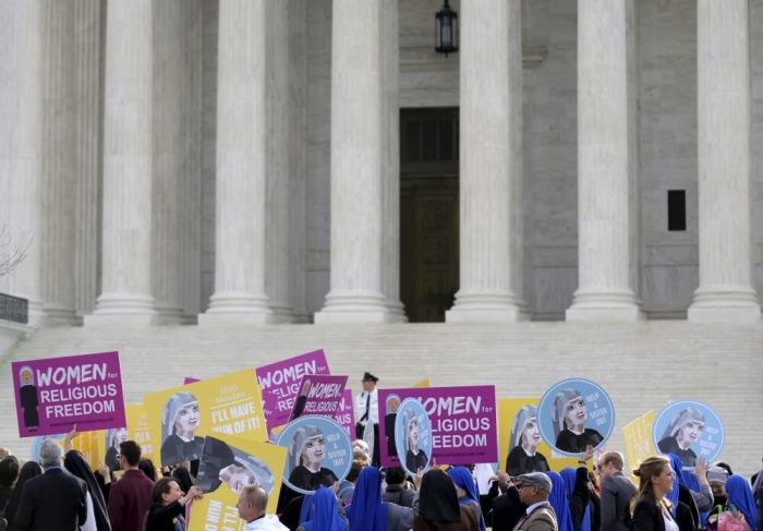 Nuns rally before Zubik v. Burwell, an appeal brought by Christian groups demanding full exemption from the requirement to provide insurance covering contraception under the Affordable Care Act, is heard by the U.S. Supreme Court in Washington, March 23, 2016.