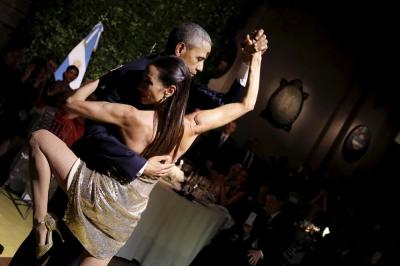 U.S. President Barack Obama dances tango during a state dinner hosted by Argentina's President Mauricio Macri at the Centro Cultural Kirchner as part of President Obama's two-day visit to Argentina, in Buenos Aires, March 23, 2016.