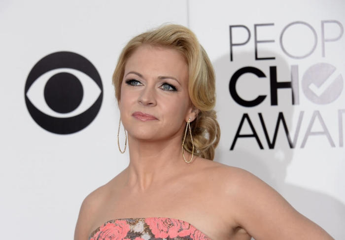 Actress Melissa Joan Hart poses as she arrives at the 2014 People's Choice Awards in Los Angeles, California, January 8, 2014.