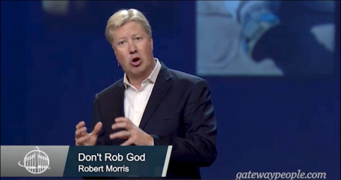 Pastor Robert Morris speaking to his congregation about tithes.