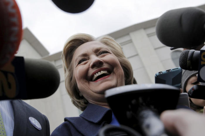 U.S. Democratic presidential candidate Hillary Clinton speaks to reporters outside Yankee Stadium in the Bronx borough of New York, April 7, 2016.
