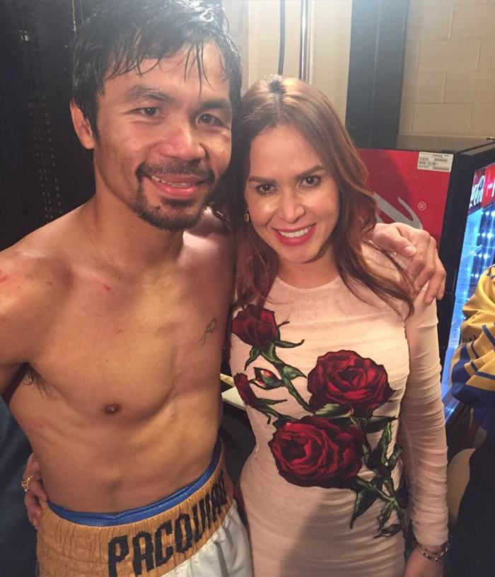 Manny Pacquiao and his wife, Jinkee, following the boxer's victory over Timothy Bradley at the MGM Grand Garden Arena in Las Vegas, NV, on Apirl 9, 2016.