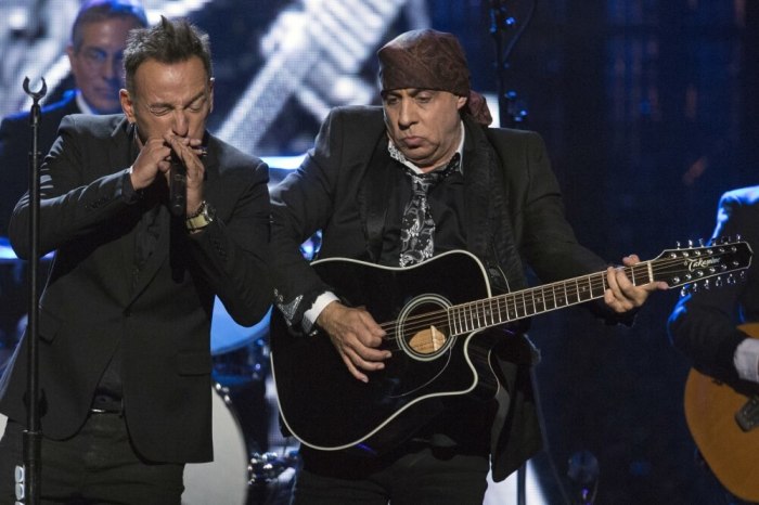 Musician Steven Van Zandt (R) of the E Street Band performs with musician and singer-songwriter Bruce Springsteen after the band was inducted by Springsteen during the 29th annual Rock and Roll Hall of Fame Induction Ceremony at the Barclays Center in Brooklyn, New York April 10, 2014.