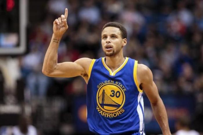 Steph Curry celebrates after hitting a jumper in a game against the Minnesota Timberwolves, 2016.