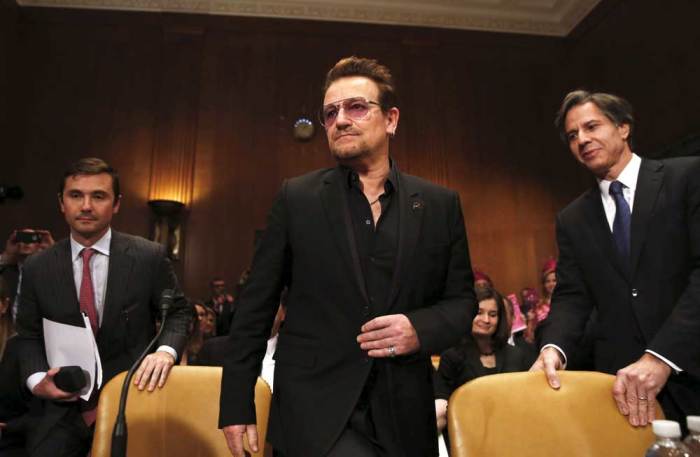 U2 lead singer Bono arrives to testify before a Senate Appropriations State, Foreign Operations and Related Programs Subcommittee hearing on 'Causes and consequences of violent extremism and the role of foreign assistance' on Capitol Hill in Washington April 12, 2016.