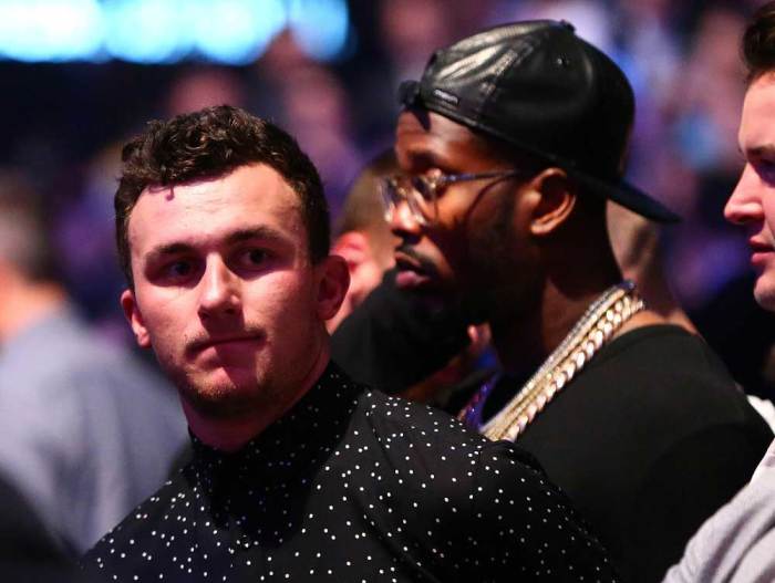 NFL players Johnny Manziel and Von Miller attend the match between Nate Diaz and Conor McGregor during UFC 196 at MGM Grand Garden Arena on March 5, 2016, in Las Vegas, Neveda.