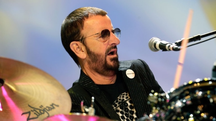 Former Beatles drummer Ringo Starr, seen performing in Riga in 2011, is back in the spotlight with a new museum exhibit revisiting his career and a forthcoming new children's book.