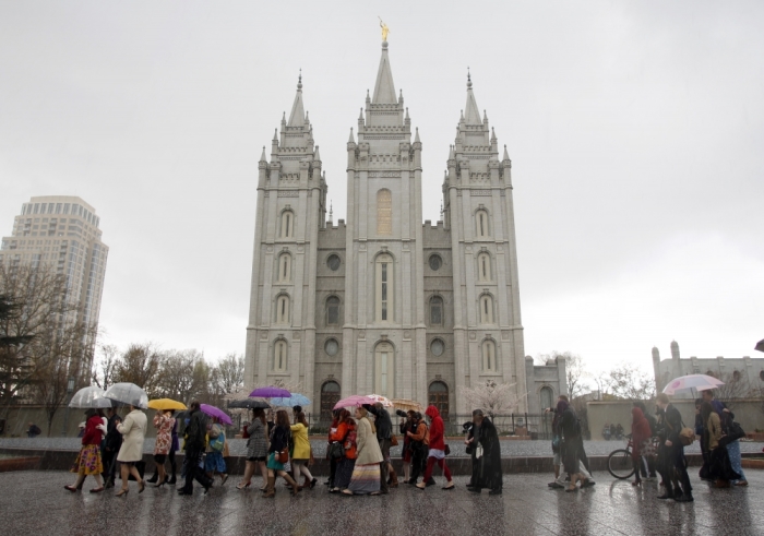 A group of Mormon women walk to Temple Square in an attempt to get tickets to the priesthood meeting at The Church of Jesus Christ of Latter-day Saints semi-annual gathering known as general conference in Salt Lake City, Utah April 5, 2014. The group, who want ecclesiastical equality with men, seeked admittance to a male-only session of the faith's spring conference on Saturday, as they promote the ordination of women into the lay priesthood of The Church of Jesus Christ of Latter-day Saints.