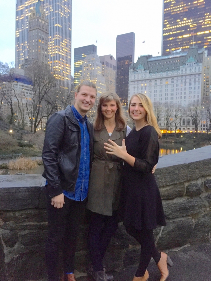 Missy Robertson poses with her newly engaged son Reed and his fiancee, Brighton Thompson, New York, December 2015.