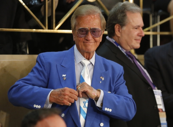 Singer and entertainer Pat Boone waits in the House visitors gallery overlooking the House Chamber for Israeli Prime Minister Benjamin Netanyahu to address a joint meeting of Congress on Capitol Hill in Washington, March 3, 2015.