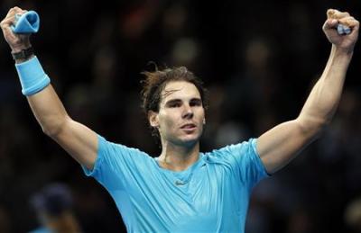 Spanish tennis star Rafael Nadal celebrates after winning a match against Stanislas Wawrinka during the ATP World Tour Finals held at the 02 Arena in London.