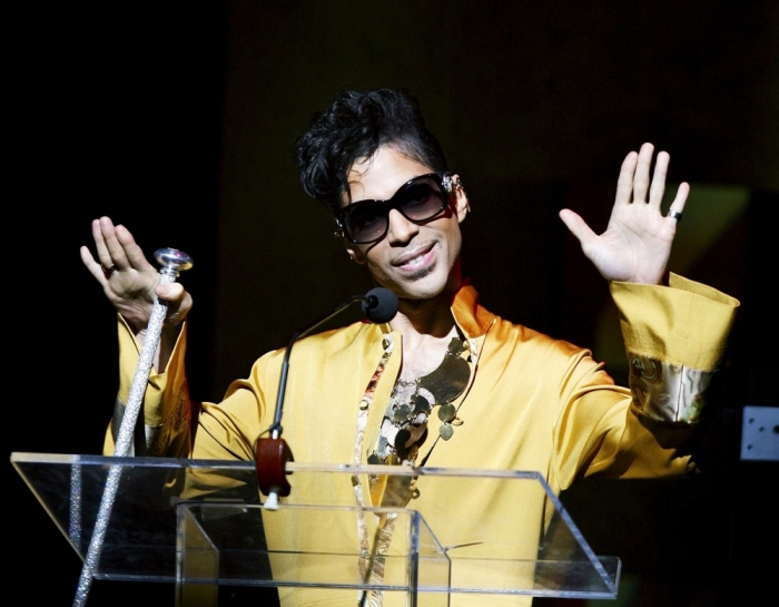 Musician Prince gestures on stage during the Apollo Theatre's 75th anniversary gala in New York, June 8, 2009. Prince has died at the age of 57, according to news reports.