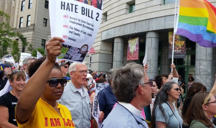 Protesters march to show their opposition against what they called 'Hate Bill 2,' which they urged lawmakers to repeal as legislators convened for a short session in Raleigh, North Carolina April 25, 2016.